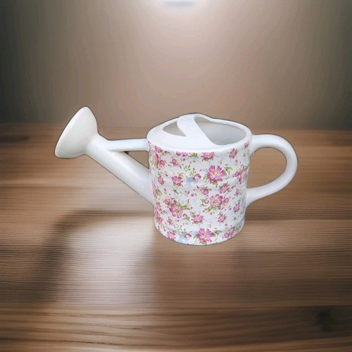 Pretty ceramic watering - watering, can