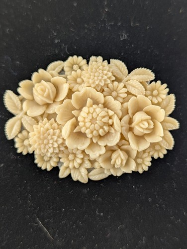 Antique carved celluloid oval - carved,