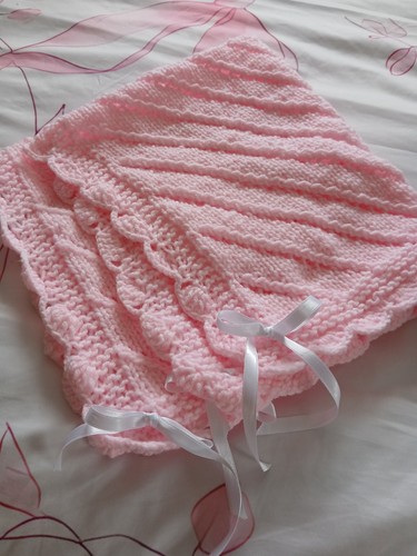 Hand knitted pink baby - hand,