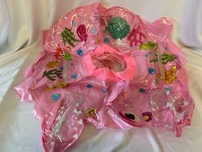 pink swim float with seat