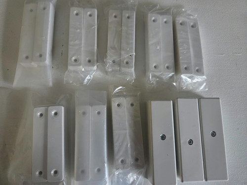 Sets burglar alarm - alarm, door