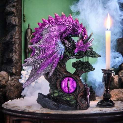 Purple dragon and eye figurine - and,