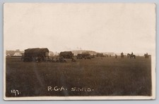WW1 RPPC Royal Garrison Artillery R.G.A. Camp Scene Guns Wagons Horses