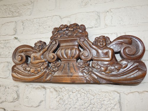 Antique wood carved putti