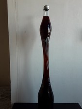 TALL STRETCHED AND TWISTED GLASS PROMOTIONAL COCA  COLA BOTTLE. 