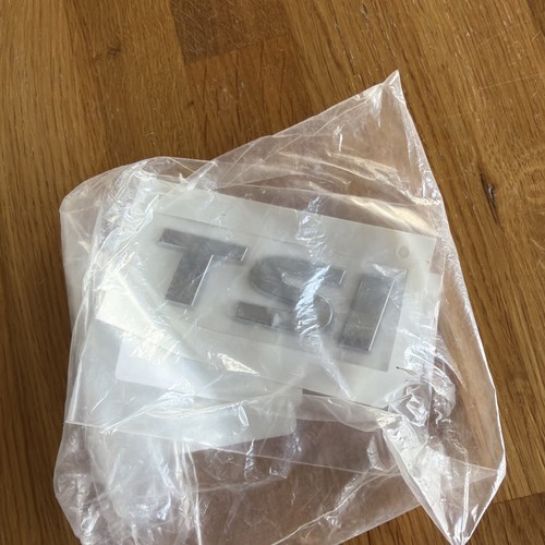 New genuine rear tsi chrome - tsi,