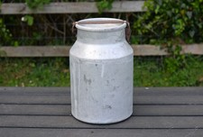 Vintage old aluminium milk