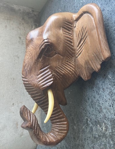 Hand carved acacia wood - carved,