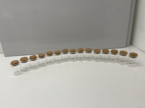 Small glass jars with - with, cork