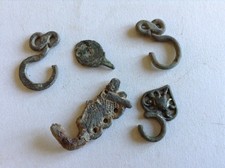 Clothing fasteners 1 Saxon 4 Tudor one showing Johna being swallod by a whale 