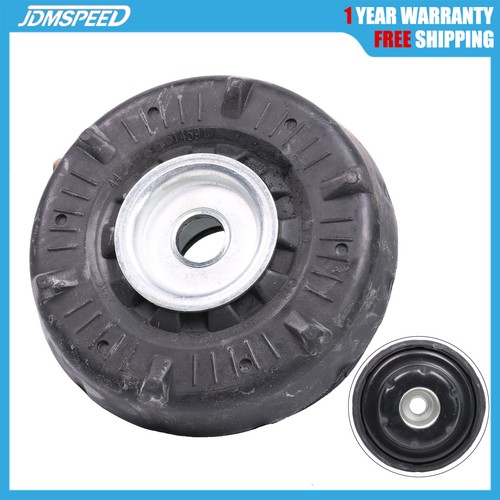 Front suspension strut top - front,