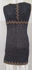 Vintage 1960 black and gold - and,