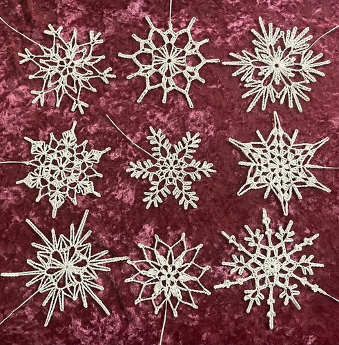 Set lace crochet snowflakes - 9,