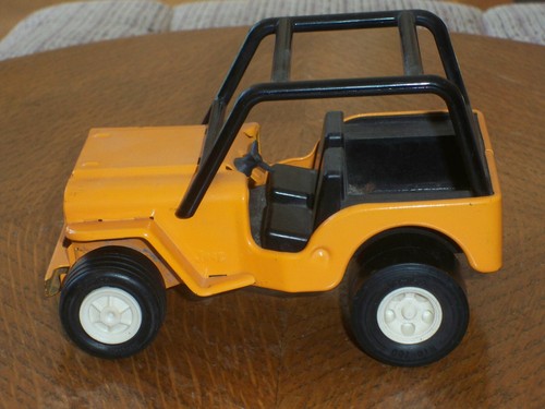 Vintage orange tonka jeep with - orange,