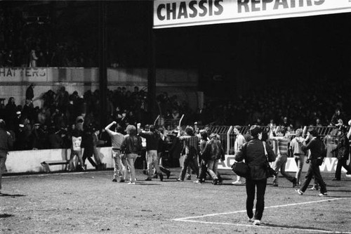 Fans invade the field - , during