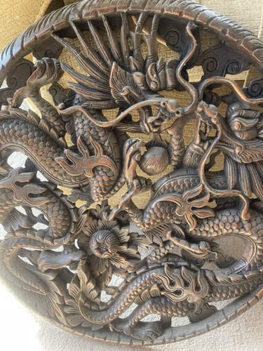 Round carved wooden dragon - carved,