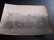 Military Men in Blankets at