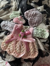 Hand Knitted dolls clothes to