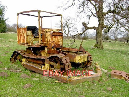 Photo old bulldozer - too, late