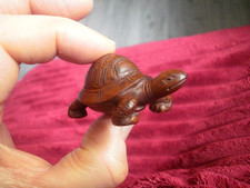 A Hand Carved wood netsuke