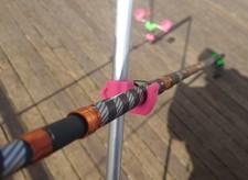 Fishing tripod rod side hook