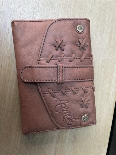Brown leather animal tri - brown, fold