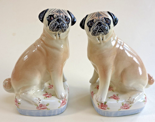 Pair ceramic pug statues by - of,