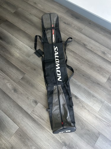 Salomon black skis - skis, bag