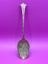 Antique silver plated sugar spoon.