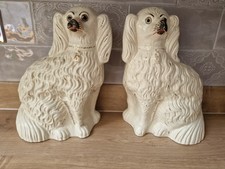 Large 30cm Antique Staffordshire Pottery Spaniel Dogs. Damage to one  as shown. 