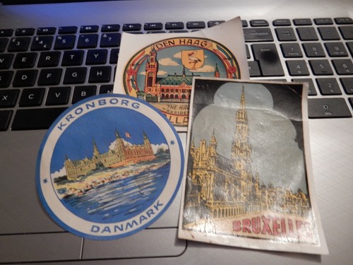 Three vintage luggage labels - three,