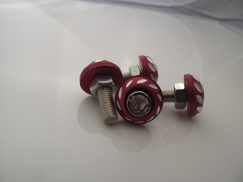 Four red screen bolts - , fairing