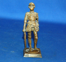 An antique small solid brass King Arthur medieval knight figure, detailed armour
