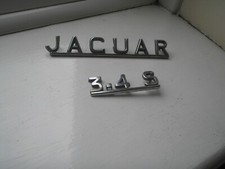 1960 s jaguar 3.4 s , boot badges