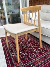 Upholstered slat back wood