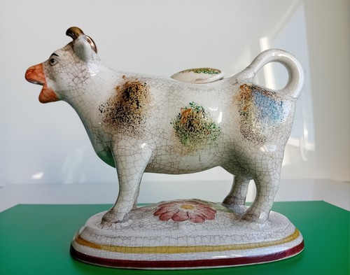 Milk creamer cow - milk, on