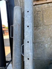 Two Galvanised Metal Gate Posts