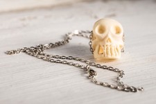 Hand Carved Bone Skull Pendant
