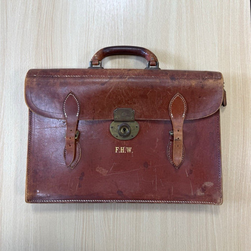 Brown leather document - leather,