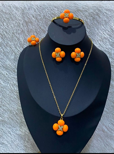 Gold tone orange flower - tone,