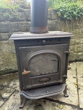 Log Burning Stove. Requires Door Seal Rope. Collection Only.