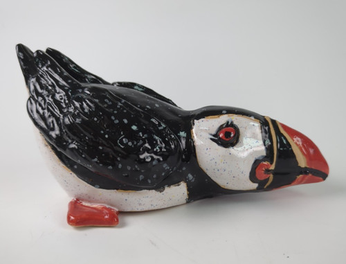 Ceramic crouching puffin