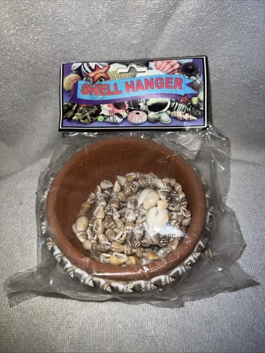 Strung sea shell plant hanger - shell,