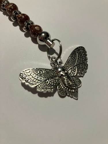 Brown silver death - death's, moth