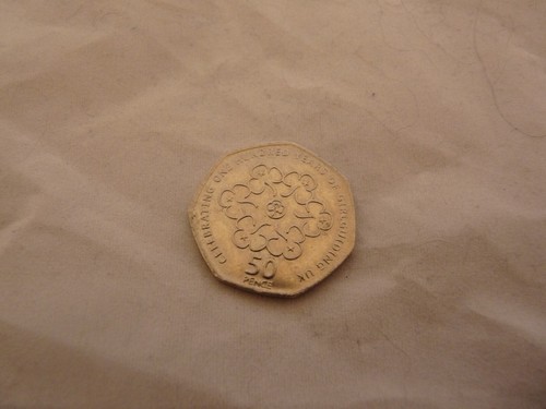 50p coin celebrating 100 - coin,