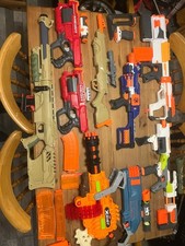 9 Nerf Guns Plus some Accessories  All In good Condition And Working
