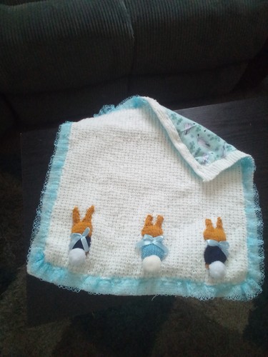 Hand knitted baby - hand,