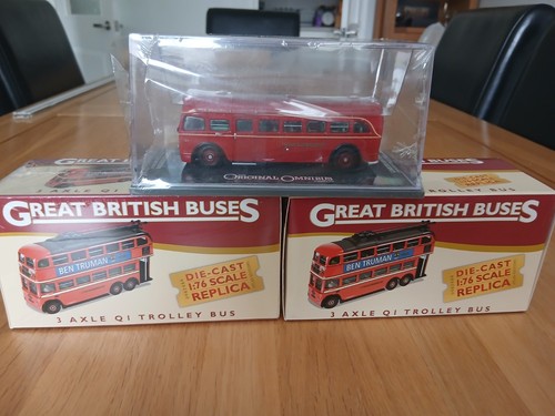 Three london transport buses - three,