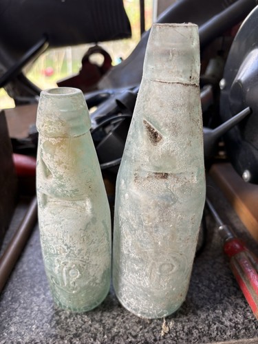 Glass bottles with marbles - with, marbles.