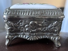 Vintage silver embossed oval